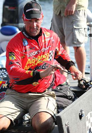 Marty Stone stows away his tackle after finishing in 28th place with 49 pounds, 11 ounces. 