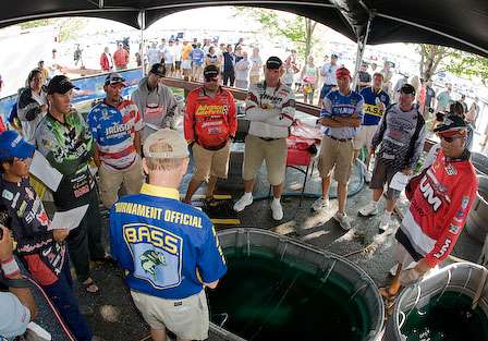 BASS Tournament Director Trip Weldon gives the top-12 a quick briefing after the Day Three weigh-in.