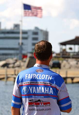 Todd Faircloth stands in his boat for the national anthem before weighing in 21 pounds, 14 ounces on Day Four. Faircloth finished sixth in the Empire Chase and leaves Lake Erie leading the Toyota Tundra Bassmaster Angler of the Year points standings. 