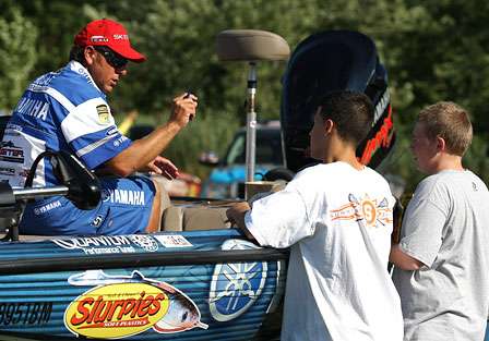In Angler Alley, fishing fans get to pick the brains of the Elite Series pros. Dean Rojas spent several minutes helping these two young fishermen understand how to catch more fish on Oneida Lake.