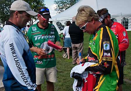 Marcos Marucelli (left) gathers autographs from Elite Series pros. Marcos fished as a co-angler in every Bassmaster Elite Series event in 2008.