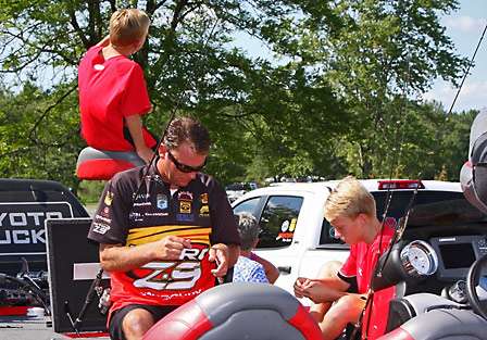 Kevin VanDam readies his gear for the Champion's Choice while hanging out with his sons, Jackson and Nicholas.
