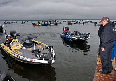 Terry Scroggins and Tommy Biffle pull to the dock simultaneously to pick up their co-anglers for the day.