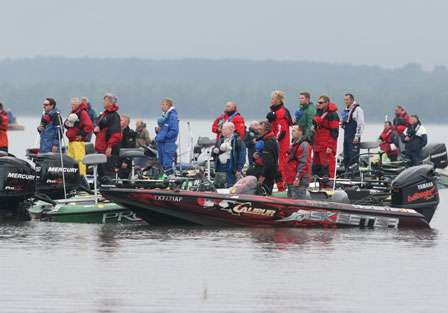 Anglers stand for the national anthem before the Day Two launch.