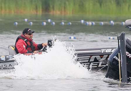 Pete Ponds idles away from the very shallow no-wake zone to begin Day Two.