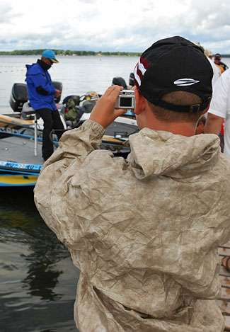 Jacob Lorea takes a picture of one of bass fishing's all-time greats, Rick Clunn.