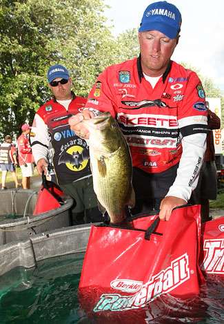Kelly Jordon sacks a fish weighing 5-pounds, that tied for the Purolator Big Bass on Day Two.