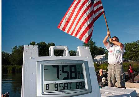 The official clock ticks away the minutes to launch as the national anthem rings through the cove at Oneida Shores.