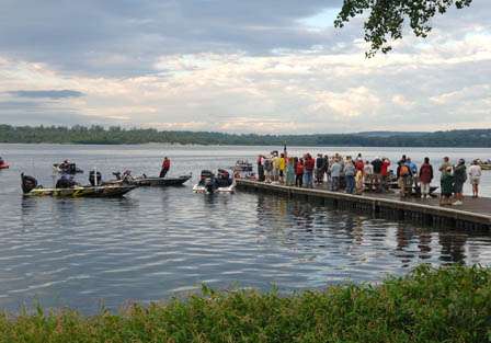 Spectators and parents crowd the pier at Onondaga Lake prior to the start of the fishing day.  In most cases, parents were more nervous than the fishermen.