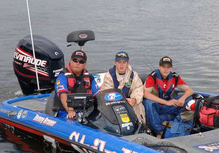 Tournament veteran Denny Brauer and his two JWC fishermen head down the check-out line for their day of competition. 
