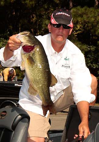 Aaron Johnson shows one of the bass that helped him get Day One off to a good start.