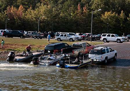 Tow vehicles backed three wide into the cove at Paris Landing to retrieve the pros and their boats.