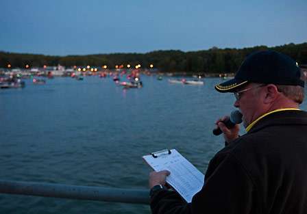 Chuck Harbin, senior tournament manager for BASS, calls out boat numbers and lines them up for inspection.