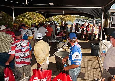The backstage area overflows with anglers as the second flight arrives.