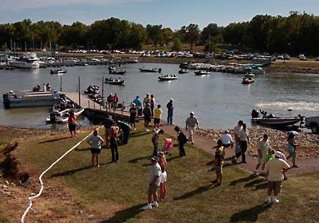 Central Open competitors wait in the cove for their tow vehicles as fans look on.