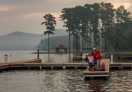 Fans are left standing alone at the docks as the final flight leaves the take-off area at Lake Guntersville State Park.