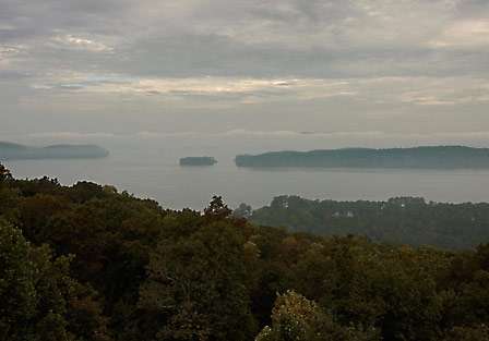 The weather forecast predicts rain by midday. The sight from Mabrey Lookout onto Lake Guntersville shows blue skies already turning grey.