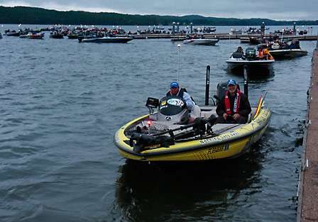 Bassmaster Elite Series Rookie of the Year Bobby Lane leads a group of boats through the inspection line and out onto Lake Guntersville.