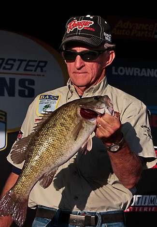 Co-Angler Bob Swisher brought a rare bass to the scale on Day One. Called a 
