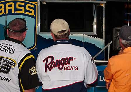 Competitors watch the leaderboard on the BASS trailer to see how the final 30 cut would shake out.
