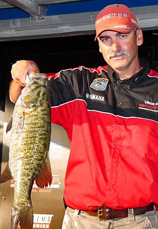 Pro Vince Fulks holds up a Lake Texoma bass that helped him to 11th place on Day Two.