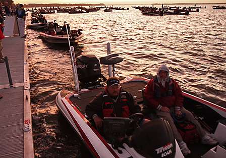 Preston Clark leads a flight of boats through the inspection process before starting the first day of competition in the first Southern Open of 2009.