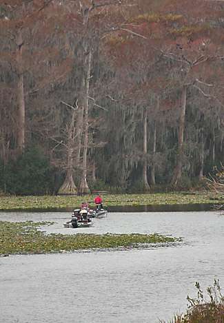 Local anglers and Open contenders share water in one of the many coves of Dora Lake.