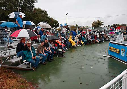 BASS fans braved the constant rain to watch almost 400 competitors cross the stage at the Day One weigh-in.