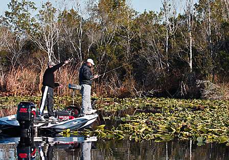 Pro Mike Prindle and his co-angler for the day, Steve Warner, work lilly pads in a canal just off Griffin Lake.