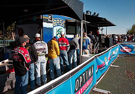 The final pros stood at the tanks as their co-anglers weighed in to decide who would take the co-angler title.