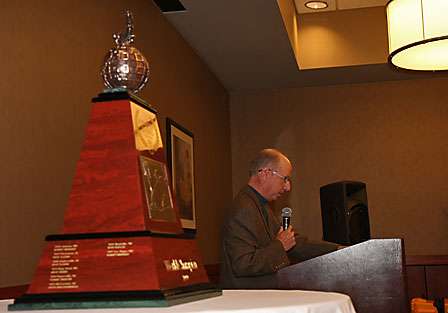 The most coveted trophy in BASS, the Bassmaster Classic trophy sits on a table at the front of the room as Tournament Director Trip Weldon addresses the field of 51 anglers.