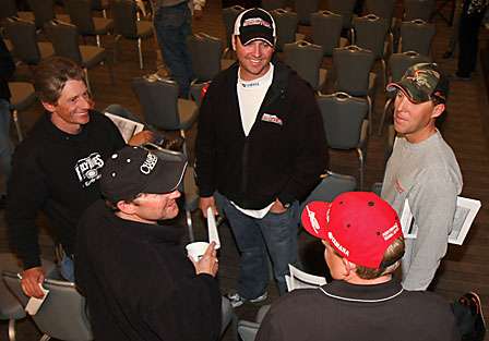 Several Elite Series pros have a light hearted conversation after the anglers meeting.