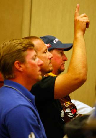 Skeet Reese raises his hand to receive clarity on one of the rules discussed during the anglers meeting.