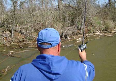 Herren fishes the abundant wood cover that the Red River has to offer.
