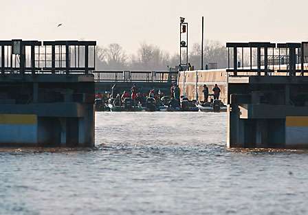 A group of anglers make their way through the lock into Pool 4.