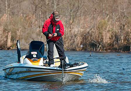 Federation Nation angler Ken Baumgardner works a bass across the front of his boat.