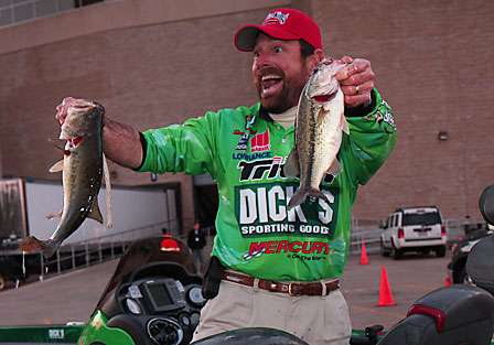 Shaw Grigsby shows out a bit for the media as he is one of the last anglers to weigh in.