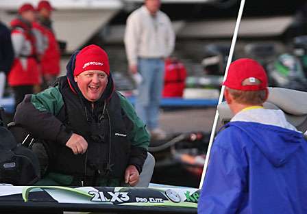 Kenyon Hill has a laugh with BASS Tournament Director Trip Weldon at the ramp as he is launched into the Red River.