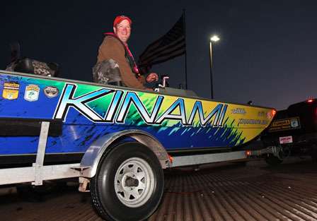 Steve Kennedy is backed into the Red River and says of his aging aluminum boat, 