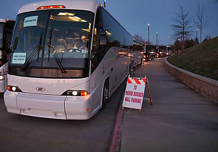 Buses wait in line to take the remaining fans back to the parking areas around Shreveport and Bossier City.