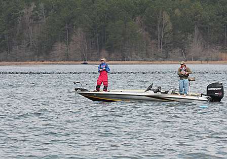 Melinda Mize and her co-angler Kenneth Harris work a long shallow point just off the main lake.