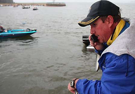 BASS Tournament Director Chris Bowes calls out boat numbers and lines the anglers up for launch.