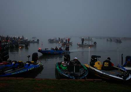 Competitors milled around the launch area, waiting on the fog to clear.