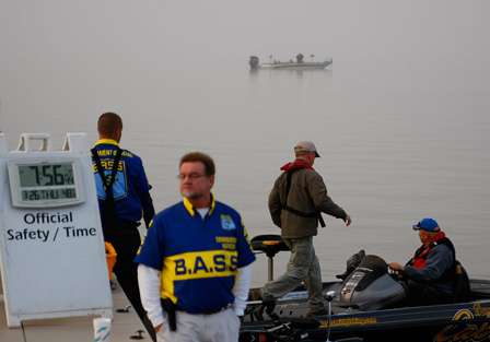 BASS Tournament Director Trip Weldon jumps in a boat to assess the visibility on the main river channel.