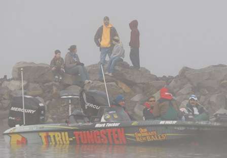 Elite Series anglers, their Marshals, and spectators wait for the Day One launch to begin.