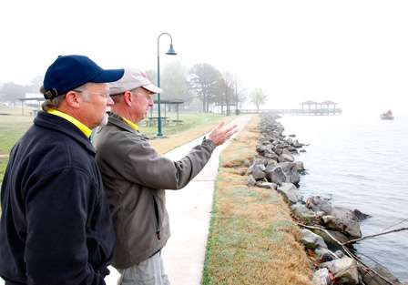 Senior Tournament Manager Chuck Harbin and BASS Tournament Director Trip Weldon make another assessment of lake conditions. The delay continued. 