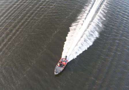 A competitor on Day Three cuts a path across Lake Kissimmee Saturday.