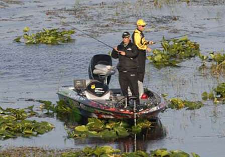 Fred Roumbanis spends his morning casting a topwater frog around lily pads and grass clumps.