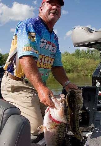Ray Sedgewick pulls two of his largest fish from his livewell, which helped him make the biggest move after Day Three of the tournament: Sedgewick charged to 3rd place with 46 pounds, 4 ounces.