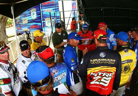 The top 12 attend a quick briefing after the Day Three weigh-in. 